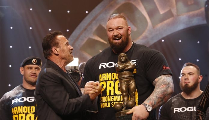 Hafthor Bjornsson wins The Arnold Strongman Classic with Gov. Arnold Schwarzenegger Photo by Dave Emery main Hafthor Bjornsson Wins Arnold Strongman Classic Crown
